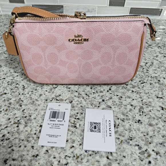 Coach Handbags - Coach Nolita 19 In Signature Canvas (Powder pink)